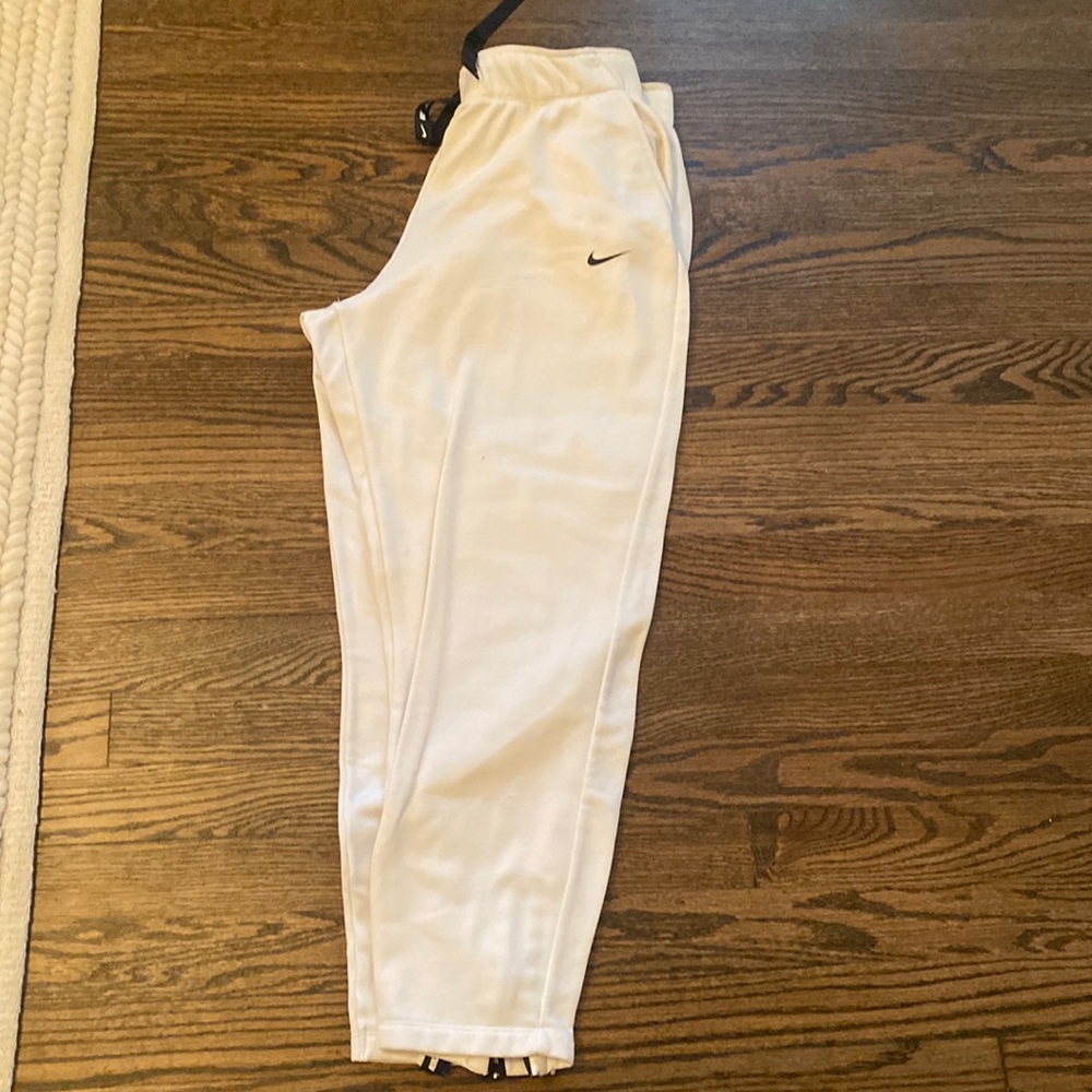 White nike sweatpants with black ribbon detail